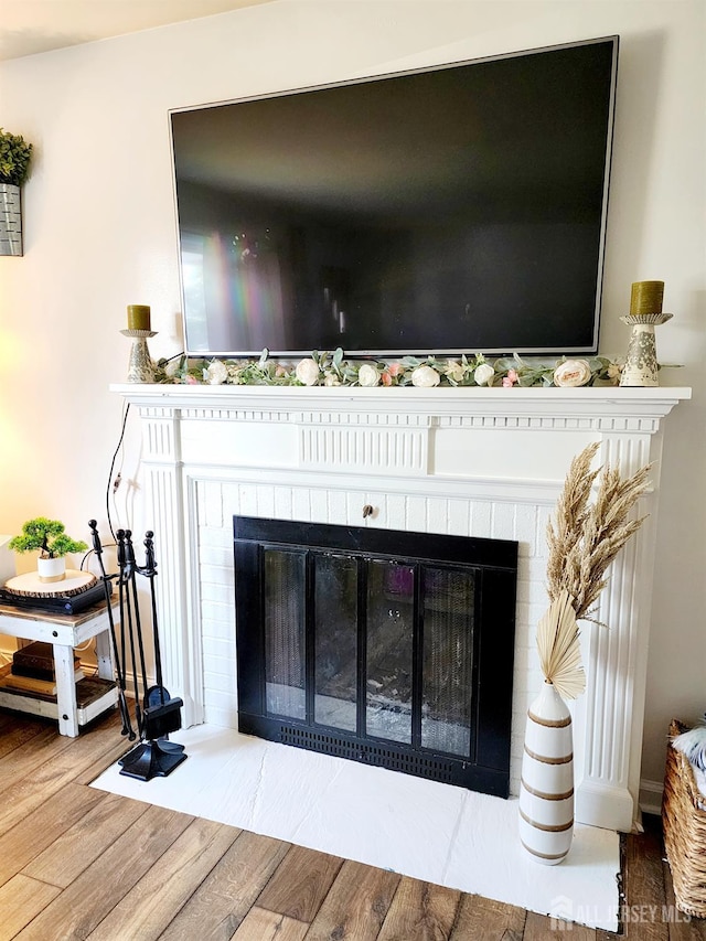 539 Locust Ave, Garwood, NJ 07027 - detailed view of a fireplace and wood finished floors