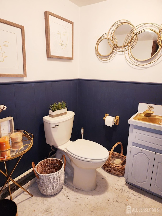 539 Locust Ave, Garwood, NJ 07027 - half bathroom featuring wainscoting, vanity, and concrete floors