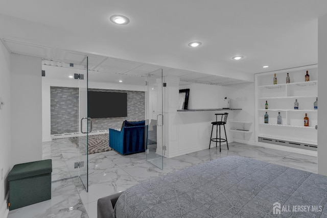 interior space with recessed lighting, a baseboard radiator, and marble finish floor