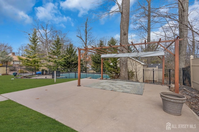 view of patio / terrace featuring fence