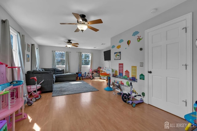 896 Kearney Dr, North Brunswick, NJ 08902 - recreation room with wood finished floors and ceiling fan