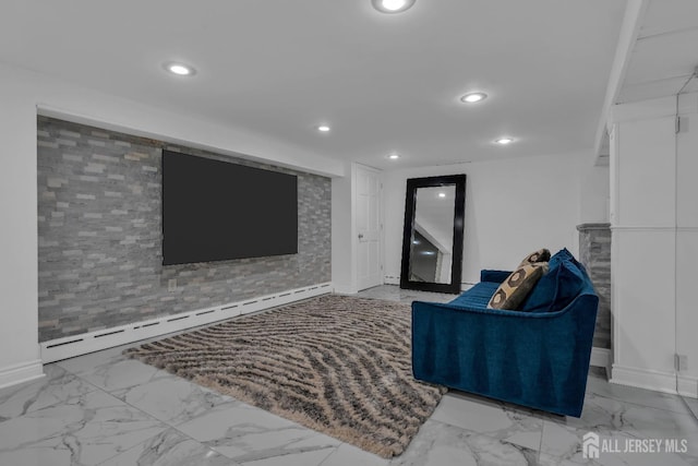 living room with a baseboard heating unit, recessed lighting, and marble finish floor