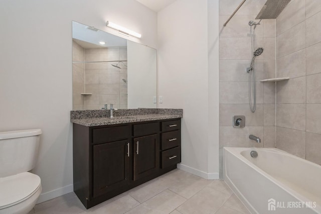 bathroom with toilet, vanity, bathing tub / shower combination, and baseboards