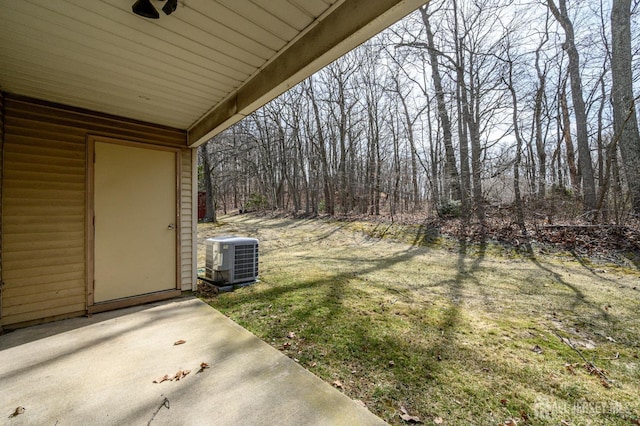 view of yard featuring central AC unit