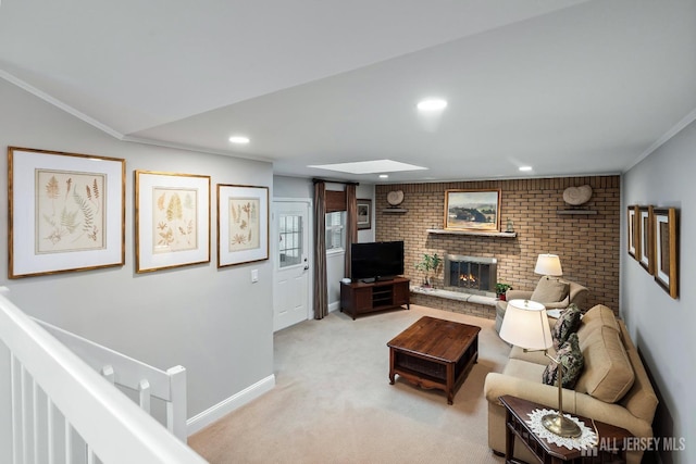 carpeted living room featuring lofted ceiling, ornamental molding, and a fireplace