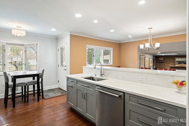 kitchen featuring gray cabinetry, a notable chandelier, dishwasher, decorative light fixtures, and sink