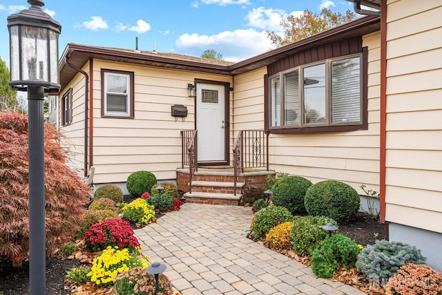 doorway to property with a patio area