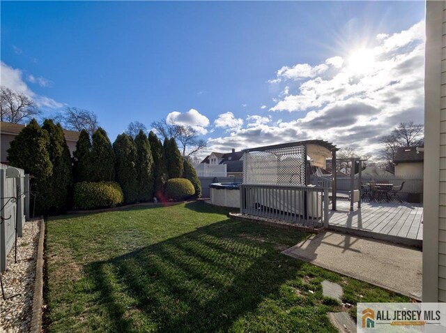 view of yard featuring a swimming pool side deck