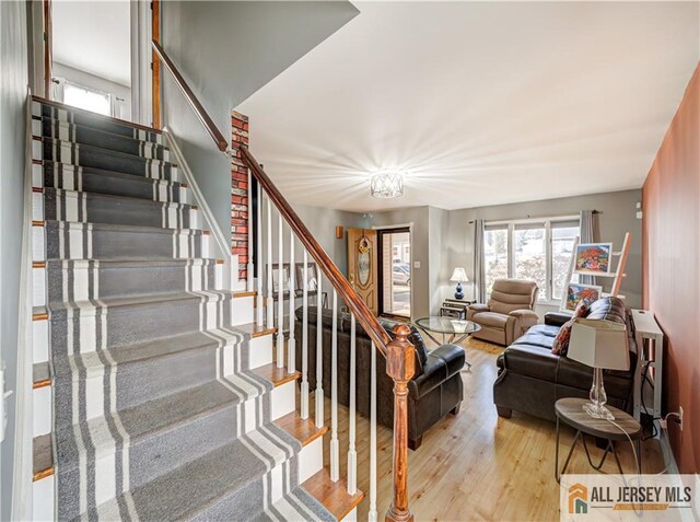 living room with light hardwood / wood-style flooring