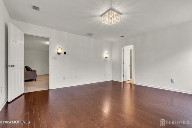 44 Begonia Ln, Monroe, NJ 08831 - empty room featuring a chandelier and hardwood / wood-style flooring