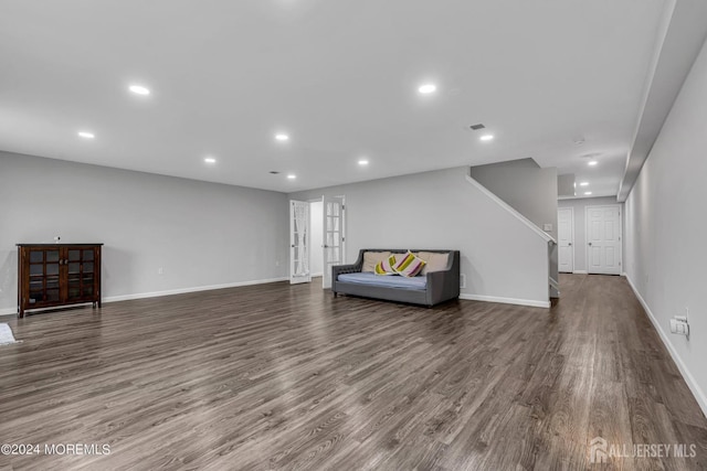 44 Begonia Ln, Monroe, NJ 08831 - sitting room with recessed lighting, dark wood-style floors, and stairs