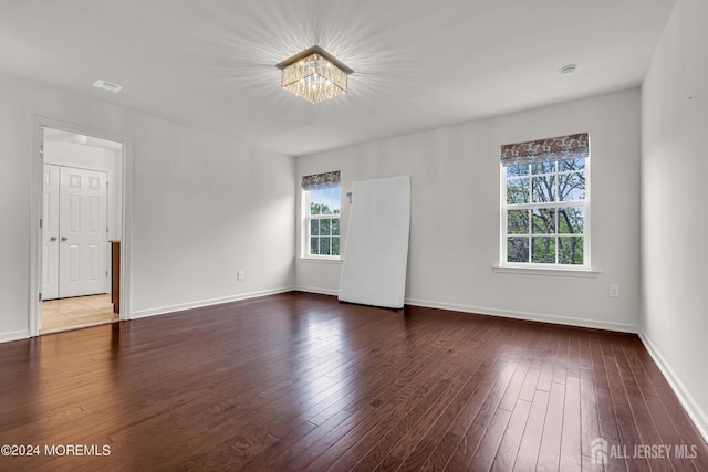 44 Begonia Ln, Monroe, NJ 08831 - unfurnished room featuring a chandelier, hardwood / wood-style floors, and a smoke detector