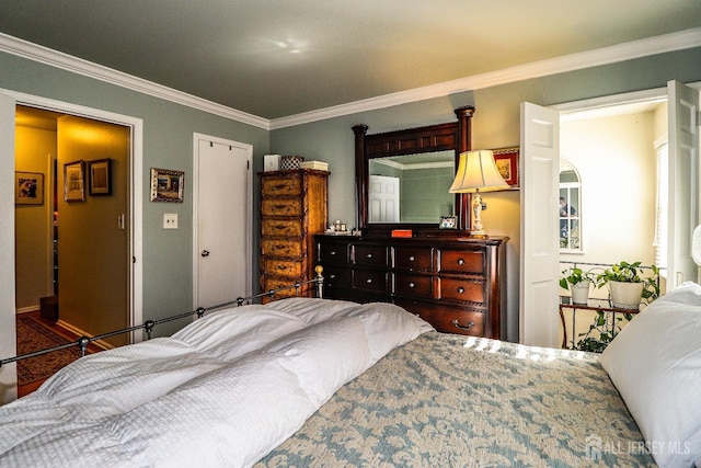 bedroom with ornamental molding