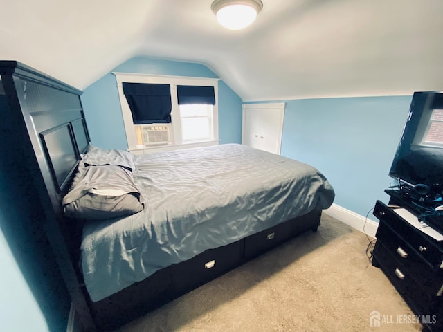 142 Liberty St, Fords, NJ 08863 - bedroom with cooling unit, light colored carpet, and lofted ceiling