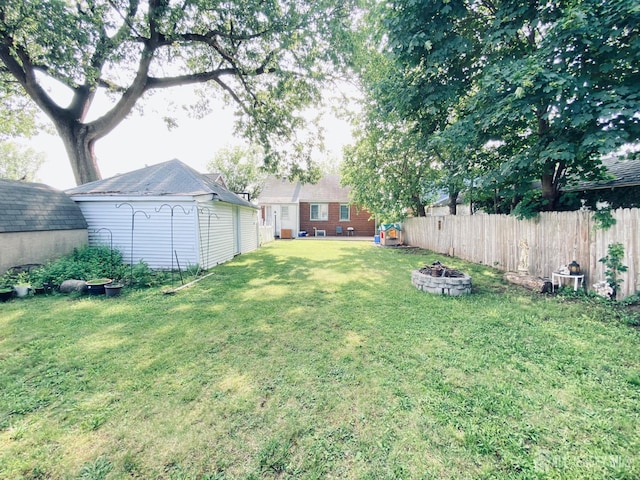 142 Liberty St, Fords, NJ 08863 - view of yard with a fire pit and an outbuilding