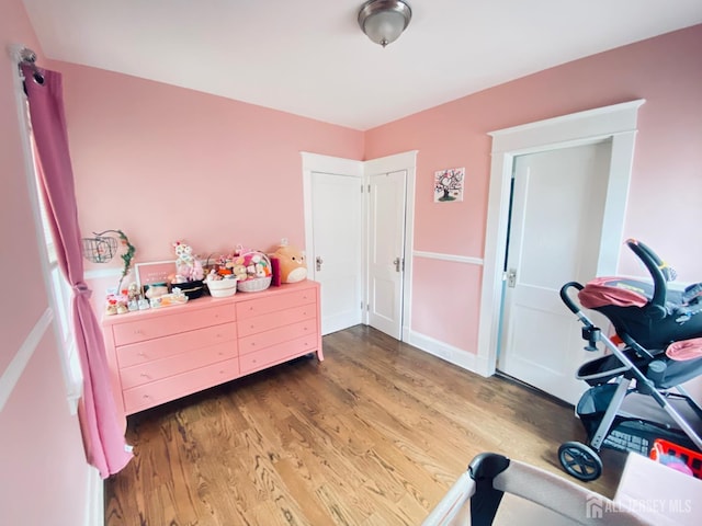 142 Liberty St, Fords, NJ 08863 - bedroom with wood finished floors and baseboards