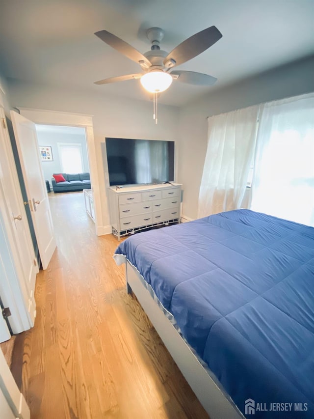 142 Liberty St, Fords, NJ 08863 - bedroom with wood finished floors and ceiling fan