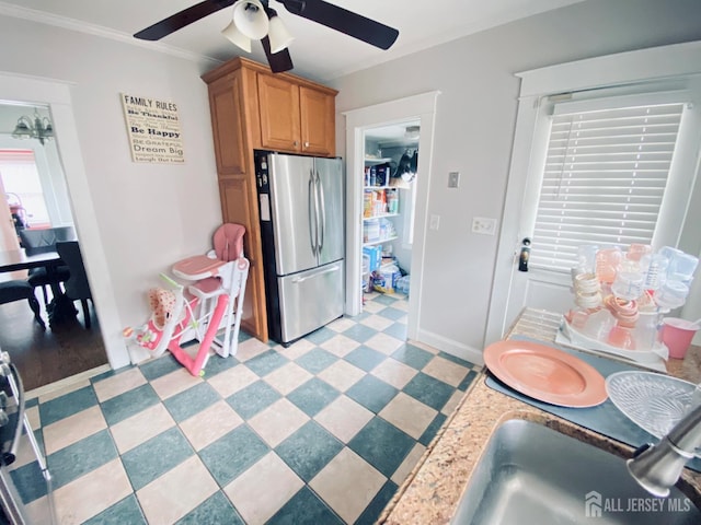 142 Liberty St, Fords, NJ 08863 - kitchen featuring freestanding refrigerator, ceiling fan, ornamental molding, and light flooring