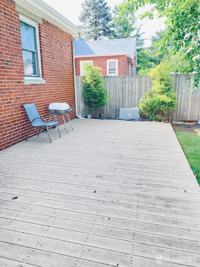 142 Liberty St, Fords, NJ 08863 - wooden deck with a fenced backyard