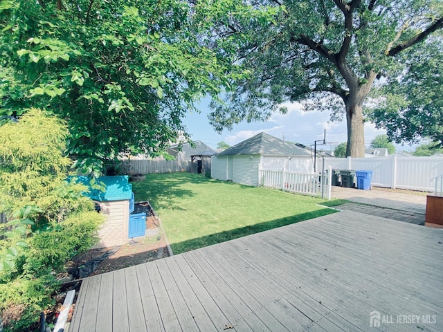 142 Liberty St, Fords, NJ 08863 - deck featuring a storage unit and a fenced backyard