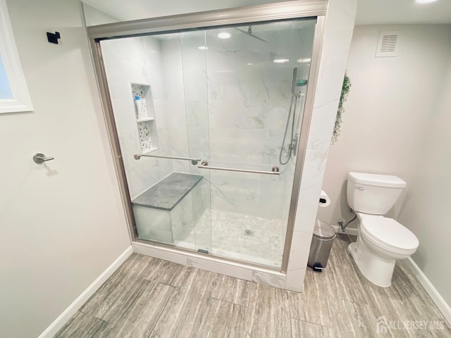 142 Liberty St, Fords, NJ 08863 - full bathroom featuring wood finished floors and a marble finish shower