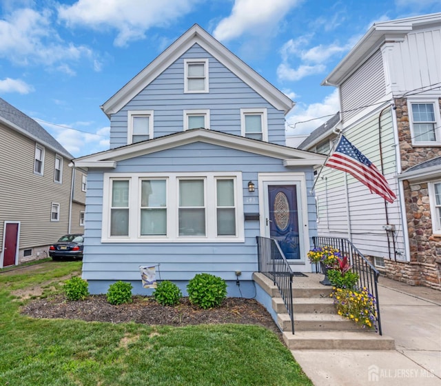143 Emerson St, Carteret, NJ 07008 - view of front of property featuring a front lawn