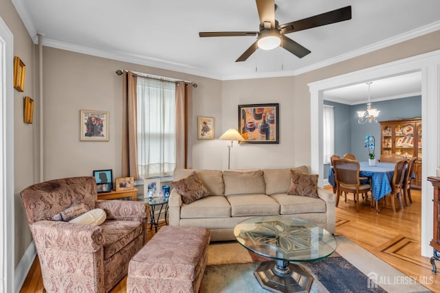 143 Emerson St, Carteret, NJ 07008 - living room featuring a chandelier, a ceiling fan, crown molding, and wood finished floors