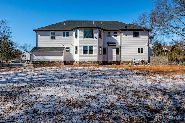 view of snow covered property