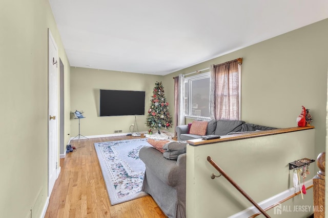 living room featuring light hardwood / wood-style flooring