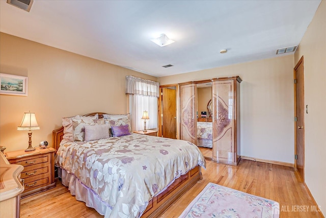 bedroom featuring light hardwood / wood-style flooring