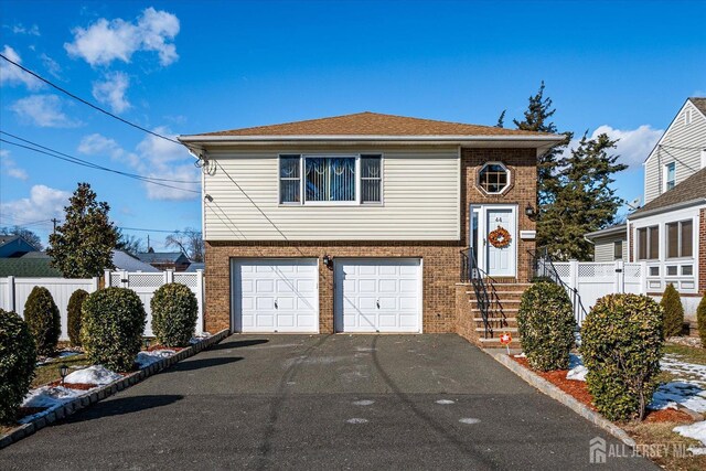 view of front of property featuring a garage