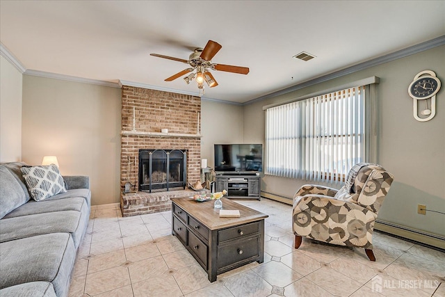 living room with crown molding, a brick fireplace, light tile patterned floors, baseboard heating, and ceiling fan