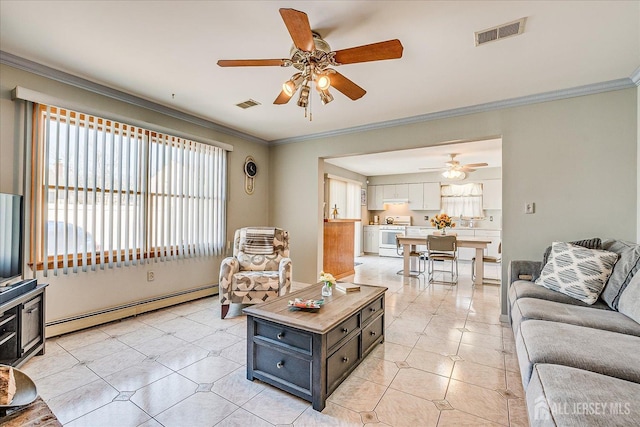 living room featuring a baseboard radiator, ornamental molding, ceiling fan, and light tile patterned flooring