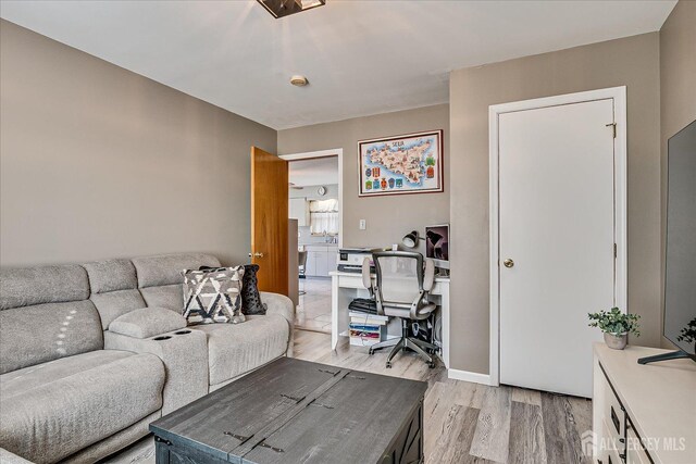 living area featuring wood finished floors