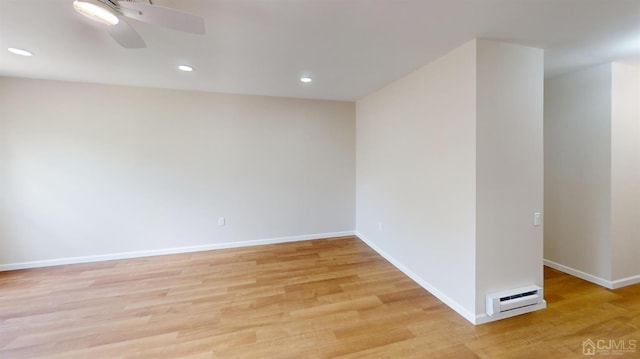 spare room with light wood-type flooring