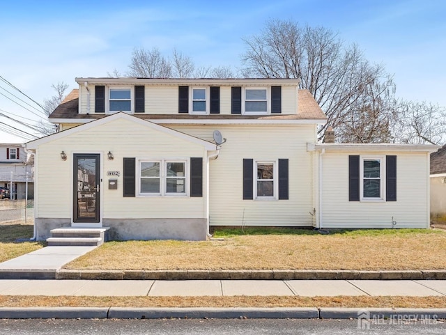 view of front of home featuring a front lawn