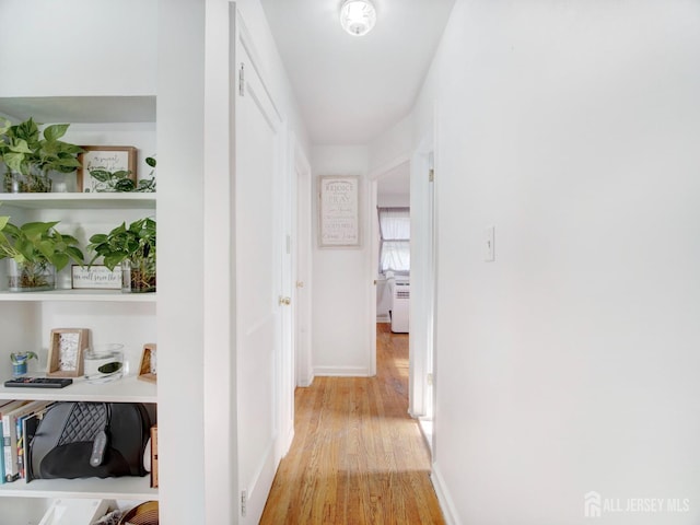 451 Burroughs Ter, Union Twp, NJ 07083 - corridor featuring light wood-type flooring and baseboards