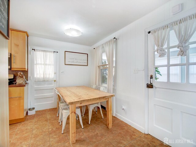 451 Burroughs Ter, Union Twp, NJ 07083 - dining room with plenty of natural light and light tile patterned floors