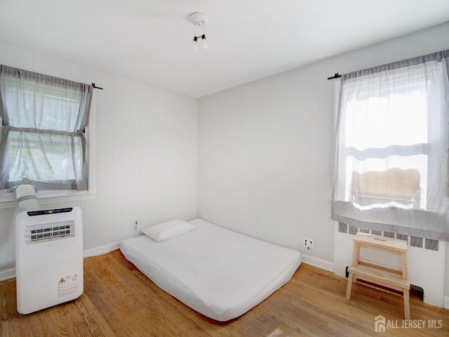 451 Burroughs Ter, Union Twp, NJ 07083 - bedroom featuring wood finished floors and radiator heating unit
