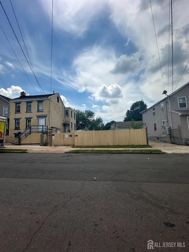 146 Seaman St, New Brunswick, NJ 08901 - view of asphalt road with sidewalks and curbs
