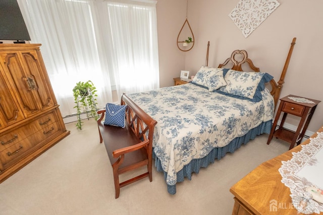 173 N Main St, Milltown, NJ 08850 - bedroom featuring light colored carpet and a baseboard radiator