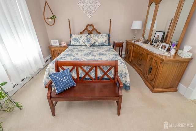173 N Main St, Milltown, NJ 08850 - bedroom featuring carpet floors, a baseboard heating unit, and baseboard heating