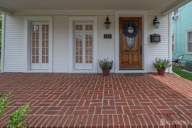 173 N Main St, Milltown, NJ 08850 - view of exterior entry with covered porch