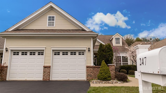 247 Springmeadow Way, Monroe, NJ 08831 - view of front of house with driveway, roof with shingles, and an attached garage