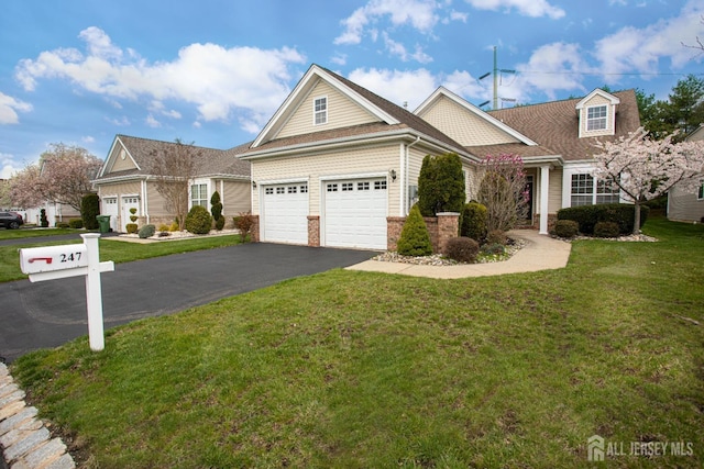 247 Springmeadow Way, Monroe, NJ 08831 - view of front facade with driveway, a front yard, and an attached garage