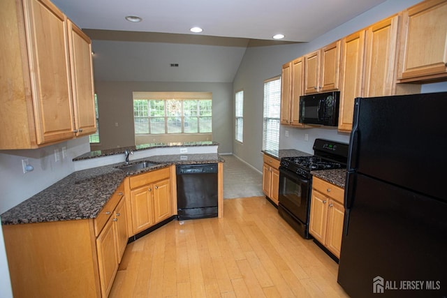 247 Springmeadow Way, Monroe, NJ 08831 - kitchen featuring black appliances, a sink, light wood-style flooring, a peninsula, and dark stone counters