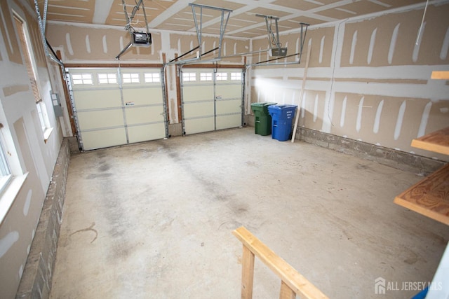 garage featuring a garage door opener
