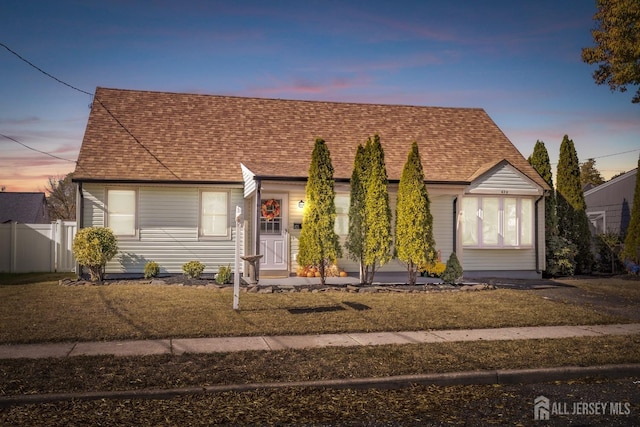 view of front of home featuring a yard