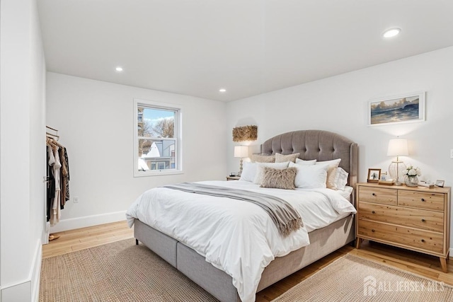 bedroom featuring hardwood / wood-style floors