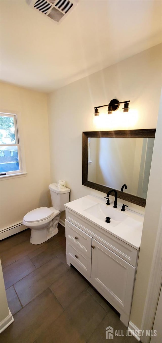 308 Codrington Pl, Bound Brook, NJ 08805 - bathroom with a baseboard heating unit and vanity